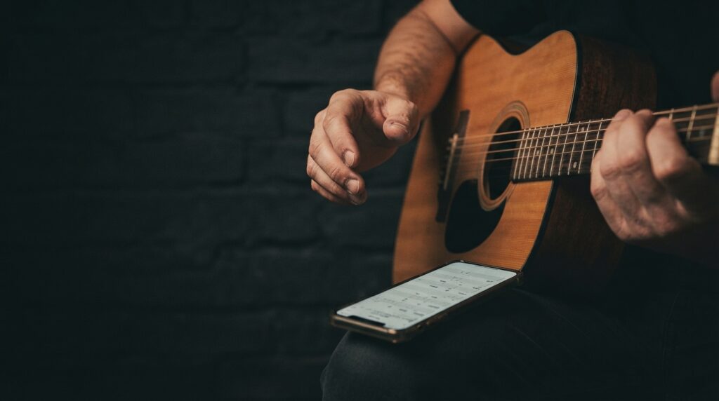 Como escolher a primeira música para tocar no violão
